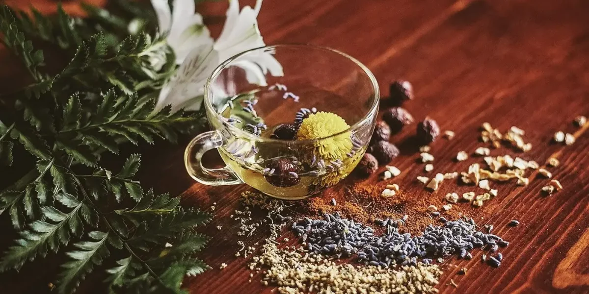 cup of herbal tea on a dark wood table
